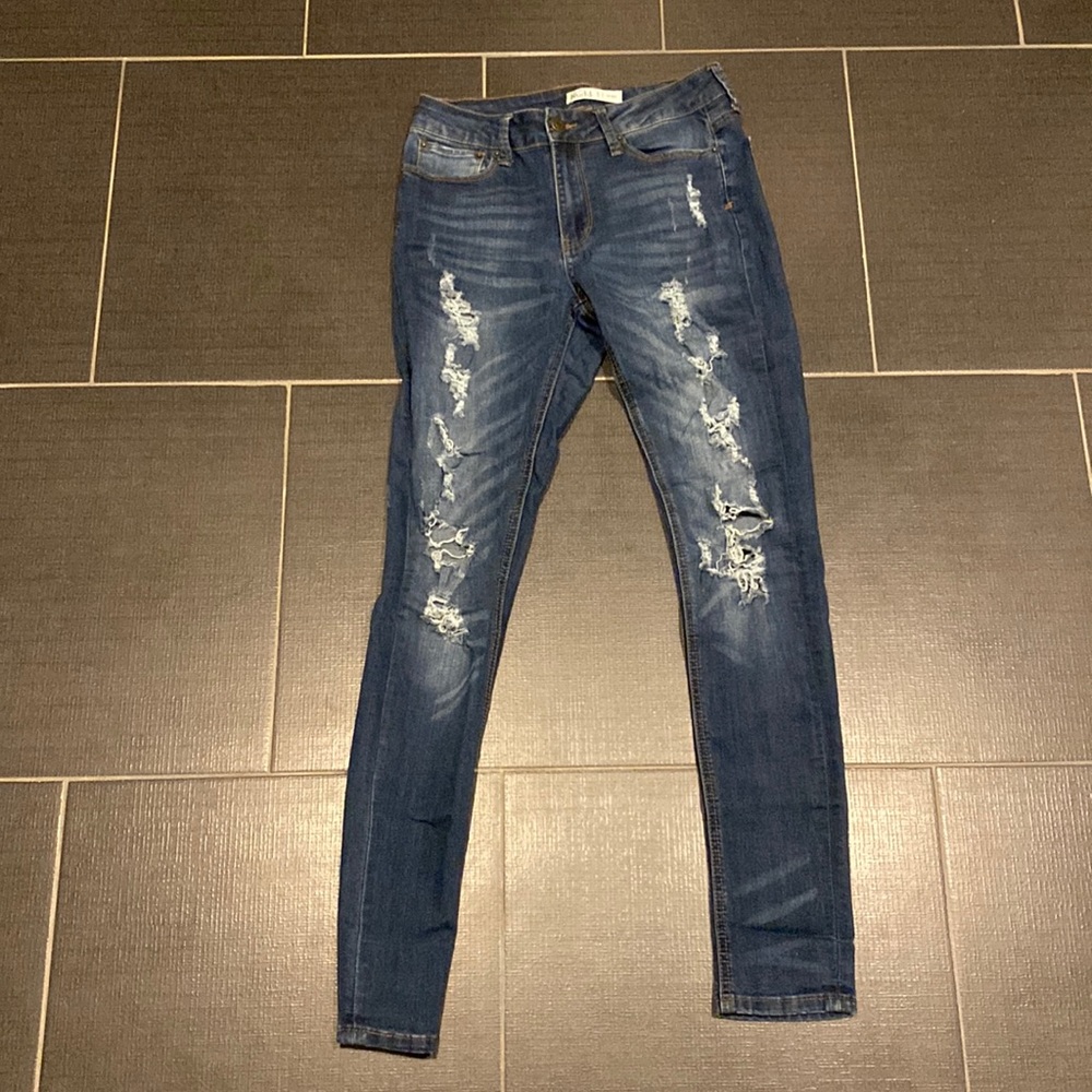 dark blue ripped jeans!